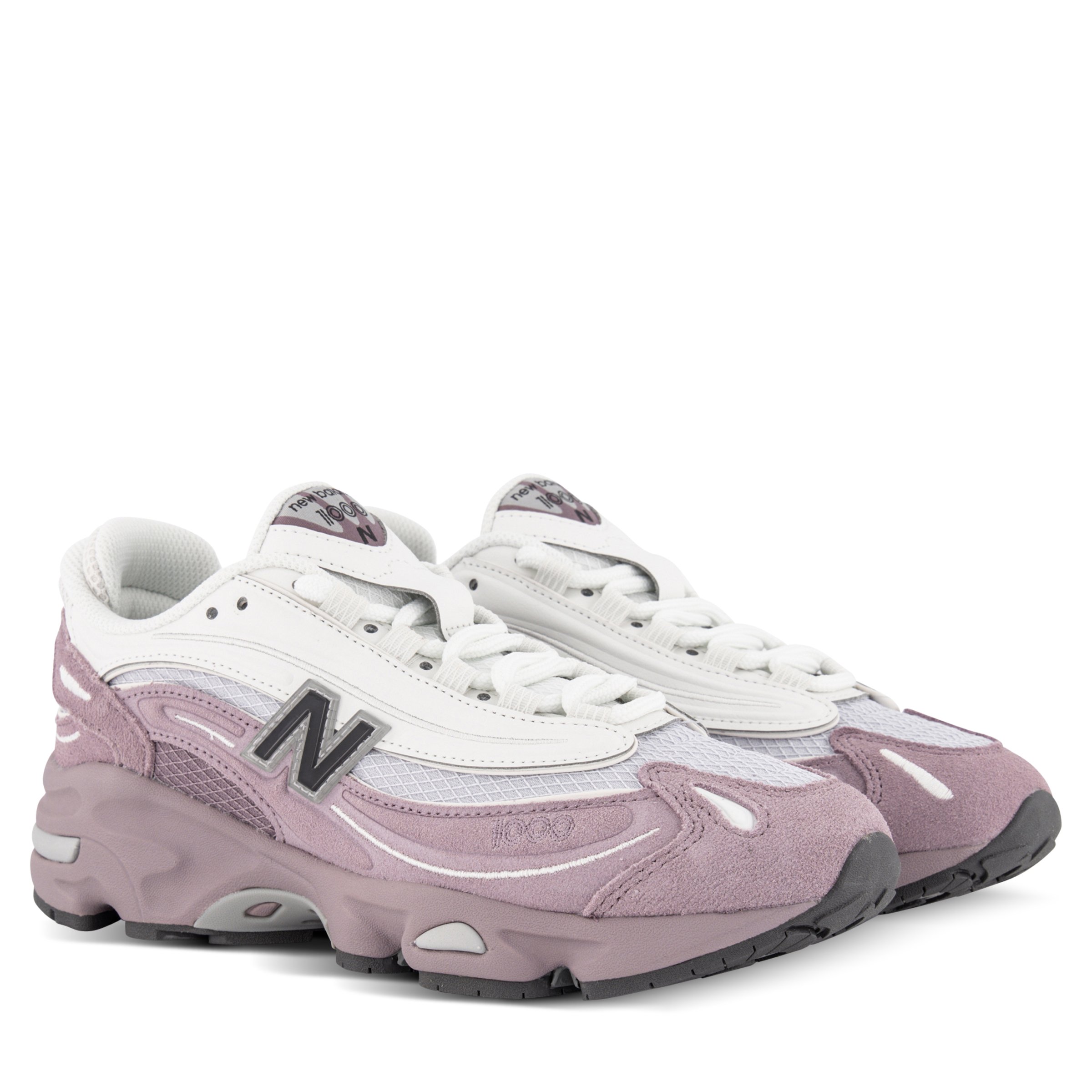 New Balance 1000 sneakers in Pale Pink & White angled right