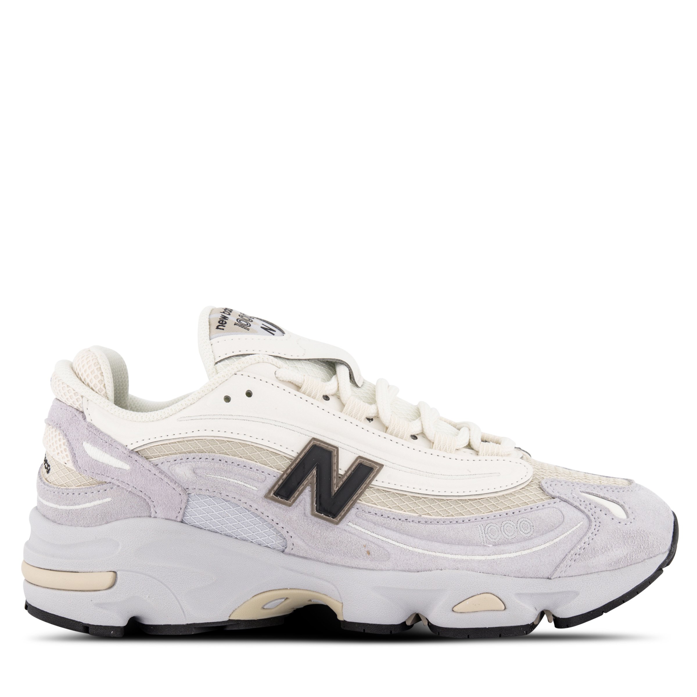 Single New Balance 1000 sneakers in Pearl Grey Pointing right outside view