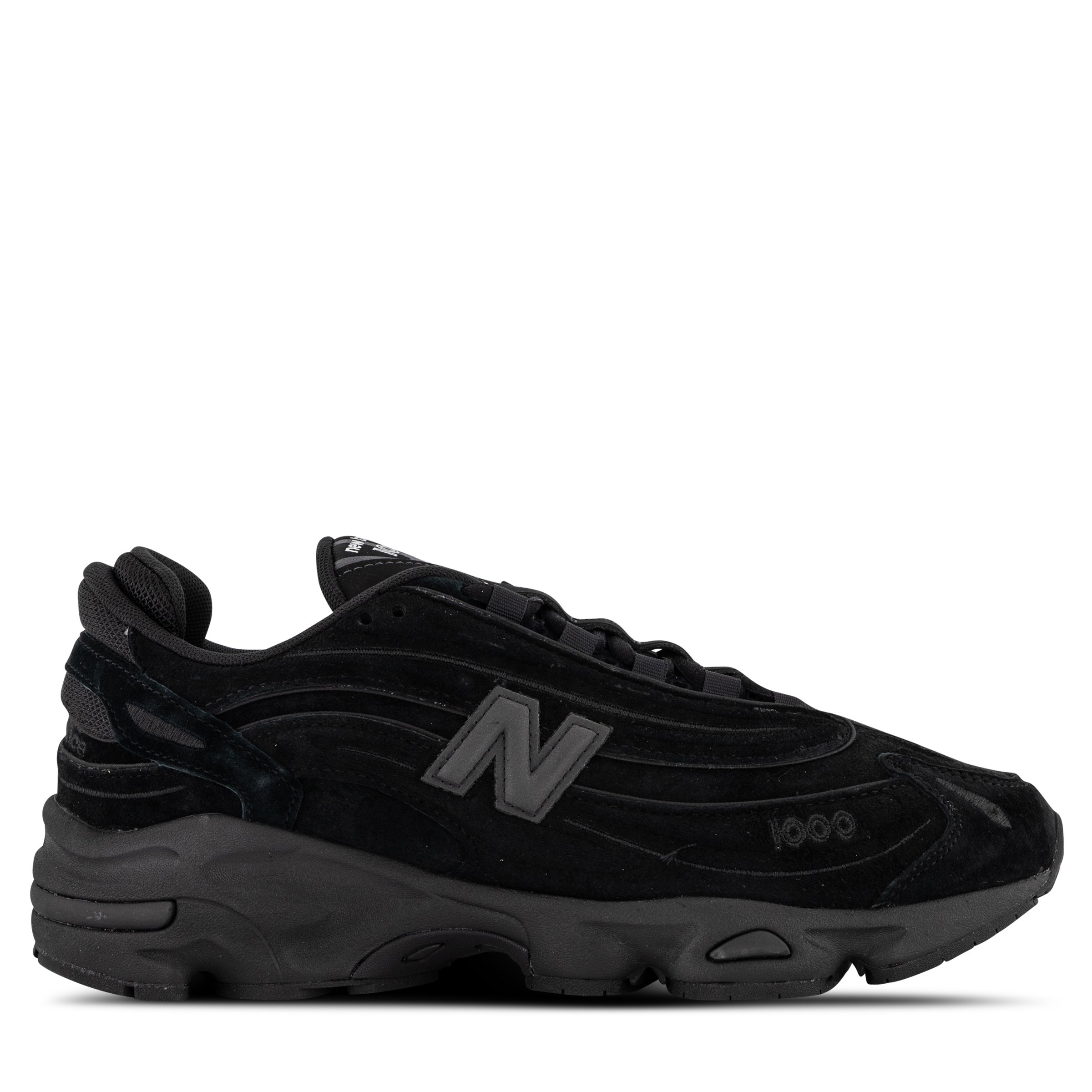 Single New Balance 740 Sneaker in All Black Pointing right outside view