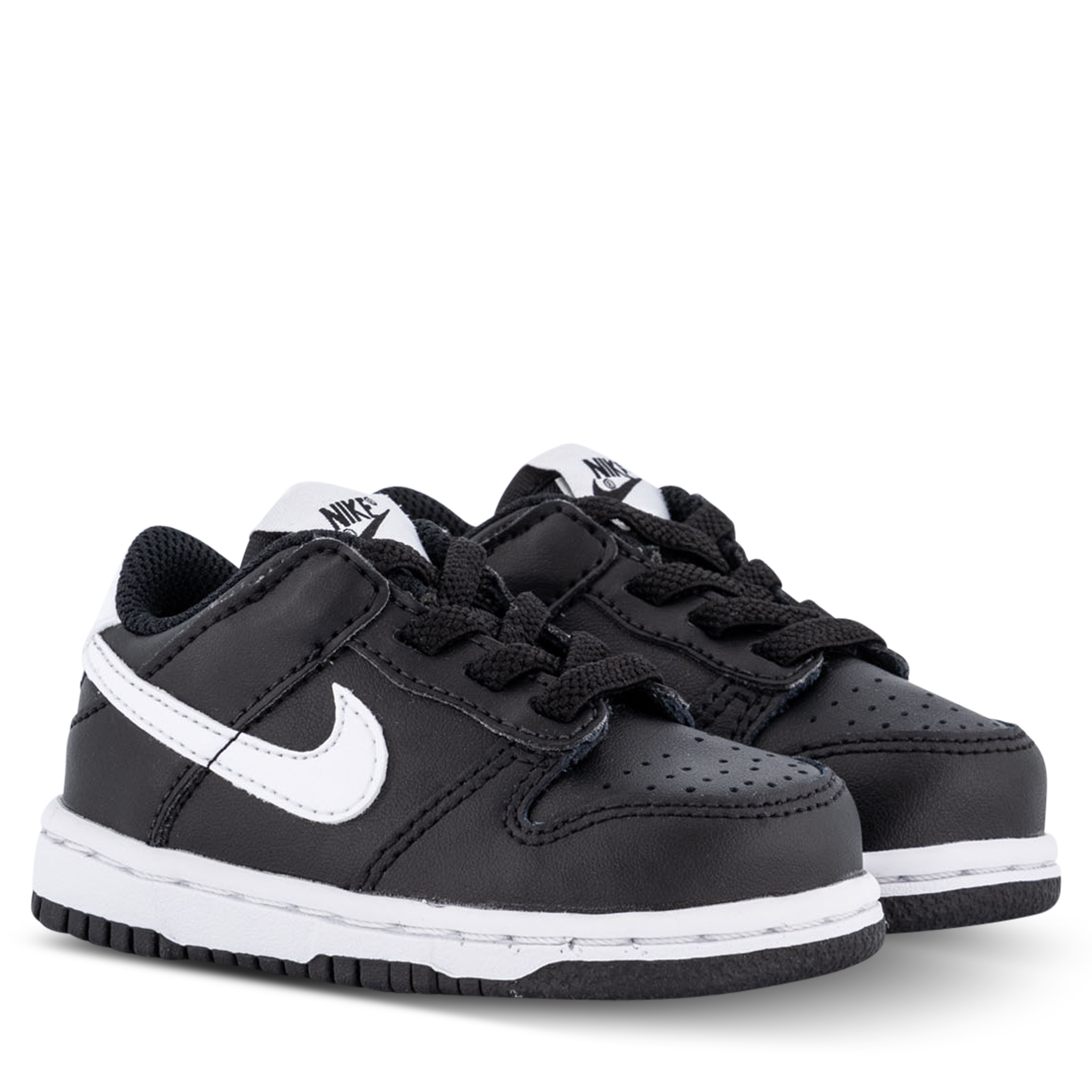 low dunks black and white youth