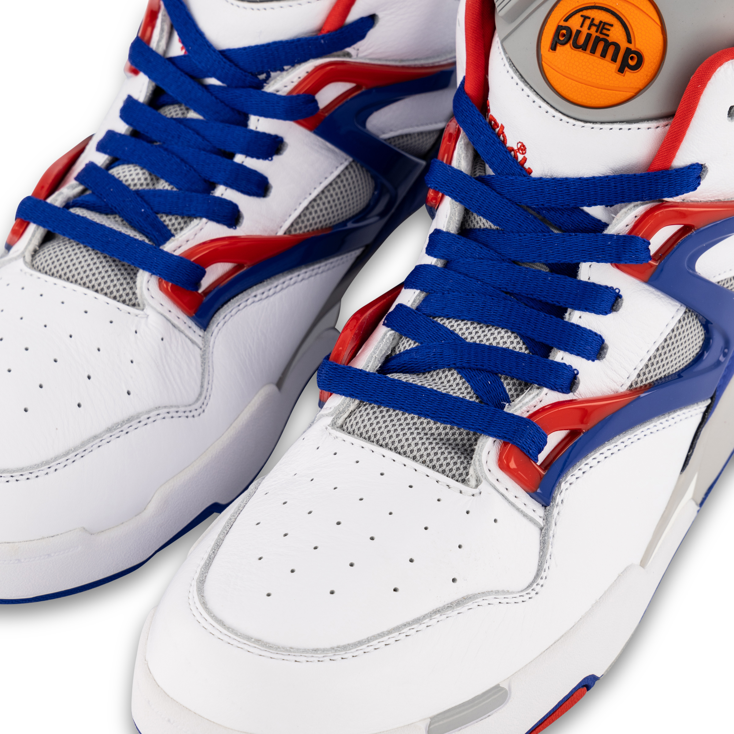 orange and blue reebok pumps