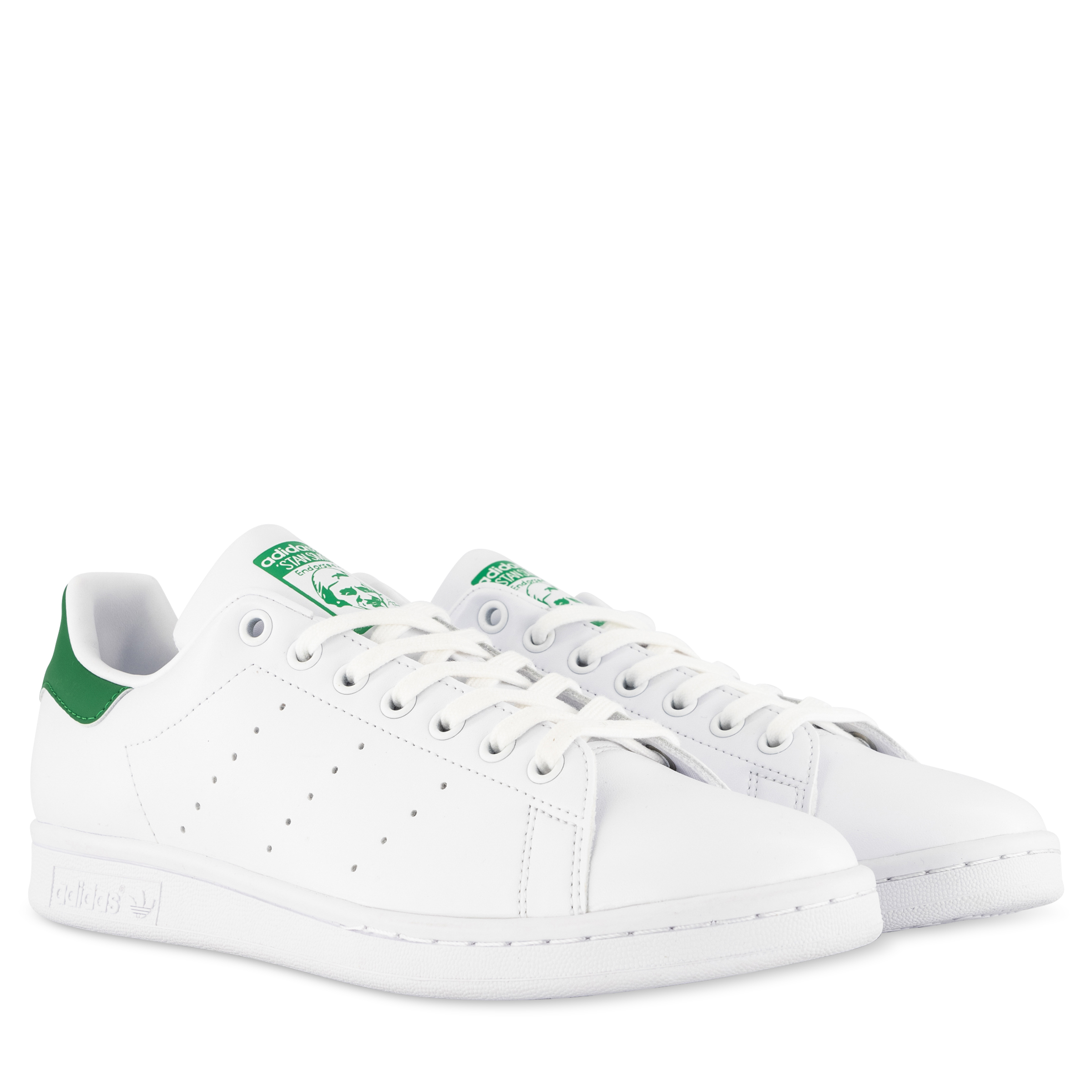 adidas white and green tennis shoes