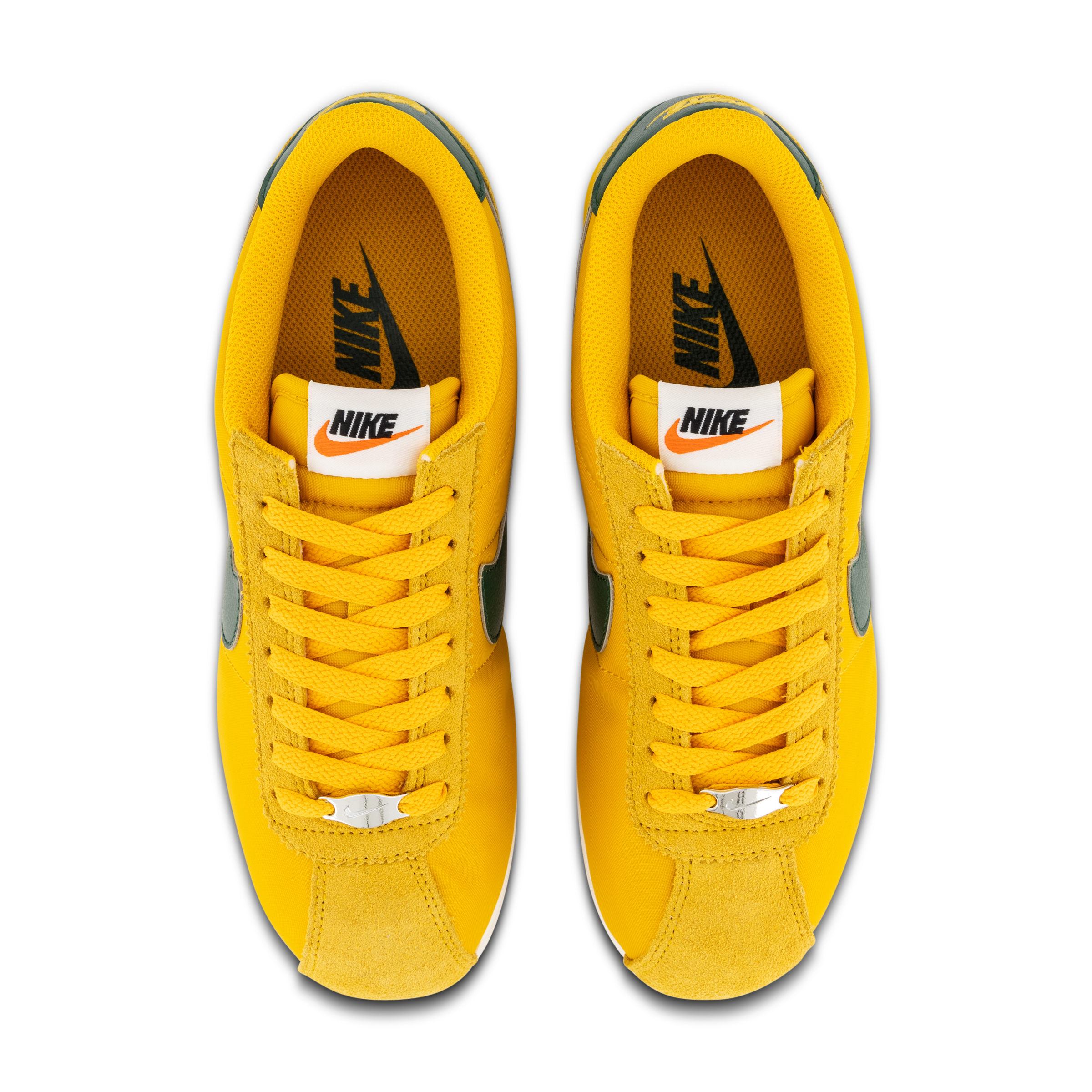 white and yellow nike cortez